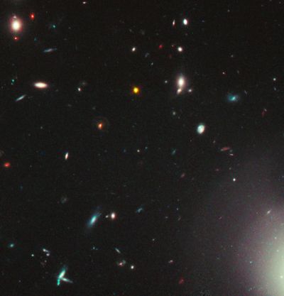 Very Distant Quasar May Be Embedded in Unusually Dusty Galaxy (Hubble View)