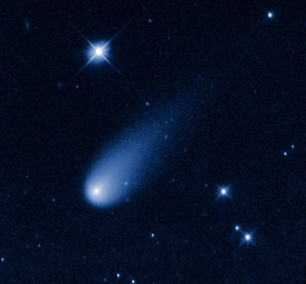 Image of a blue and white comet on a dark star-covered background.