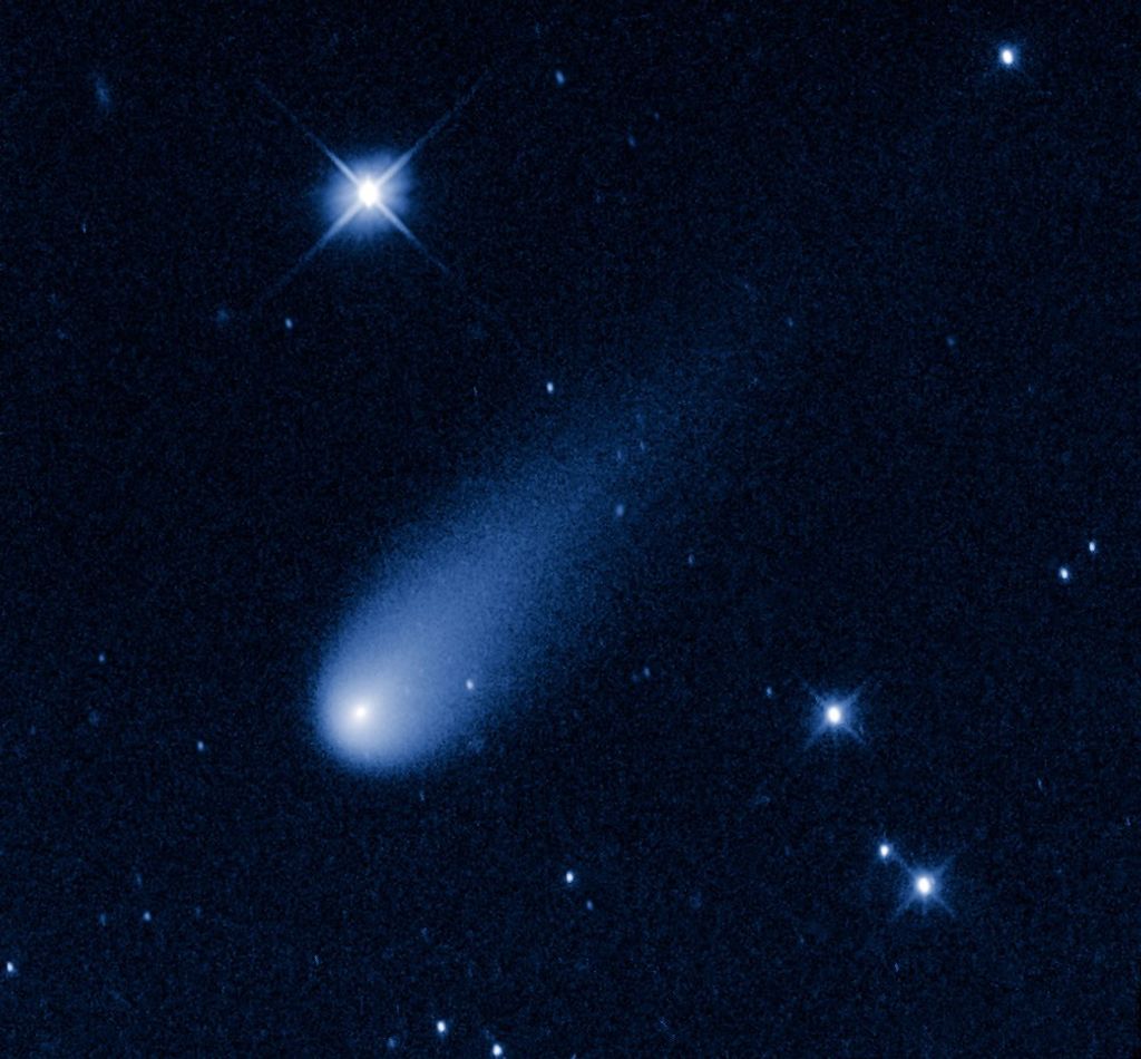 Image of a blue and white comet on a dark star-covered background.