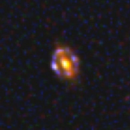 Most Distant Gravitational Lens J1000+0221