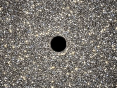 Artist’s Concept of Giant Black Hole in Center of Ultracompact Galaxy