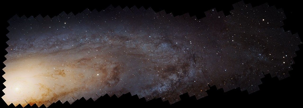 A portion of the Andromeda galaxy fills the image.