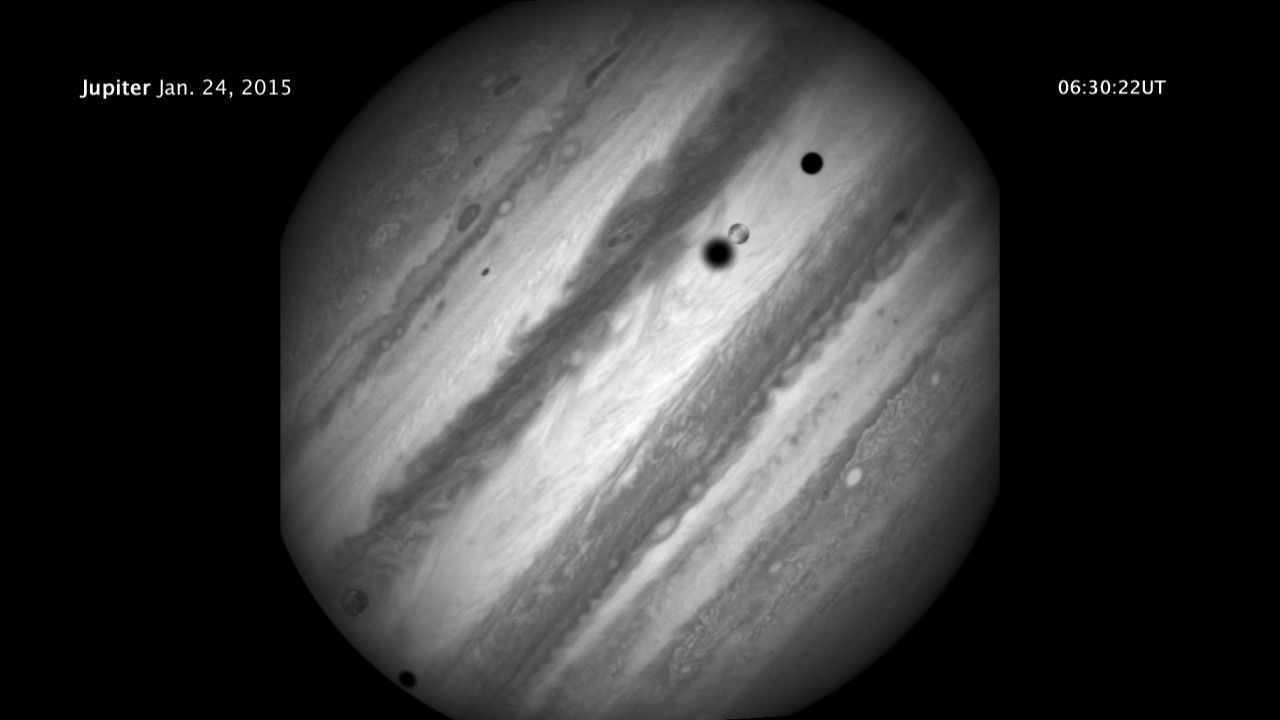 Hubble Captures Rare Triple-Moon Conjunction