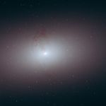 The smooth elliptical galaxy takes up a little more than a third of the frame.