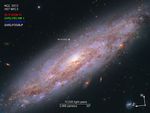 Image titled “NGC 3972, HST WFC3” with compass arrows, scale bar, and color key.