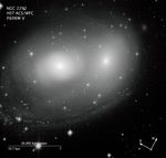 Interacting galaxies NGC 2292 and NGC 2293 with compass and scale