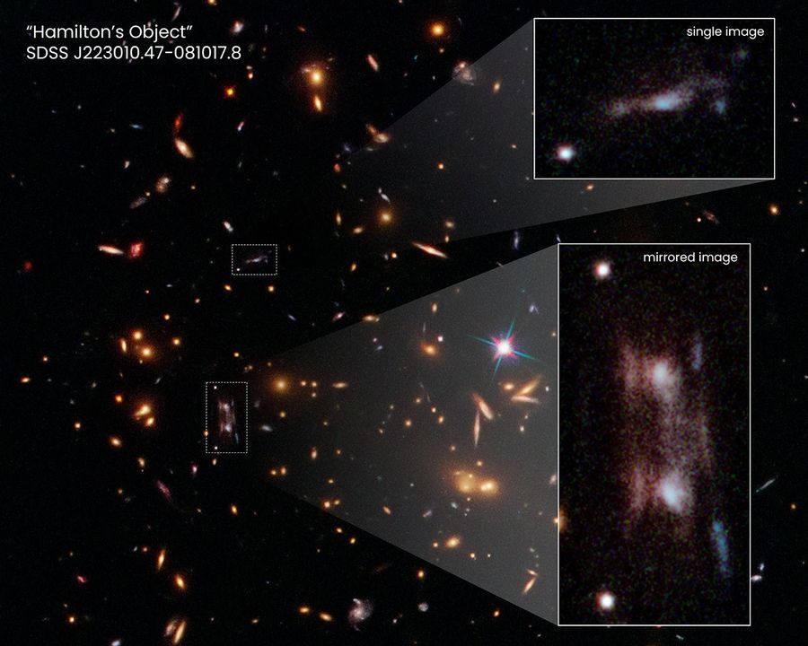 Three magnified images of a distant galaxy are seen embedded in a cluster of galaxies.