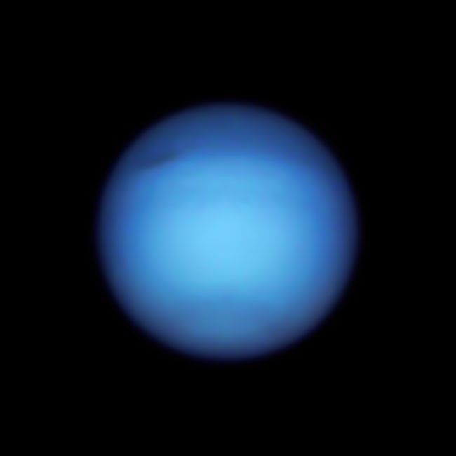 Blue sphere with dark spot