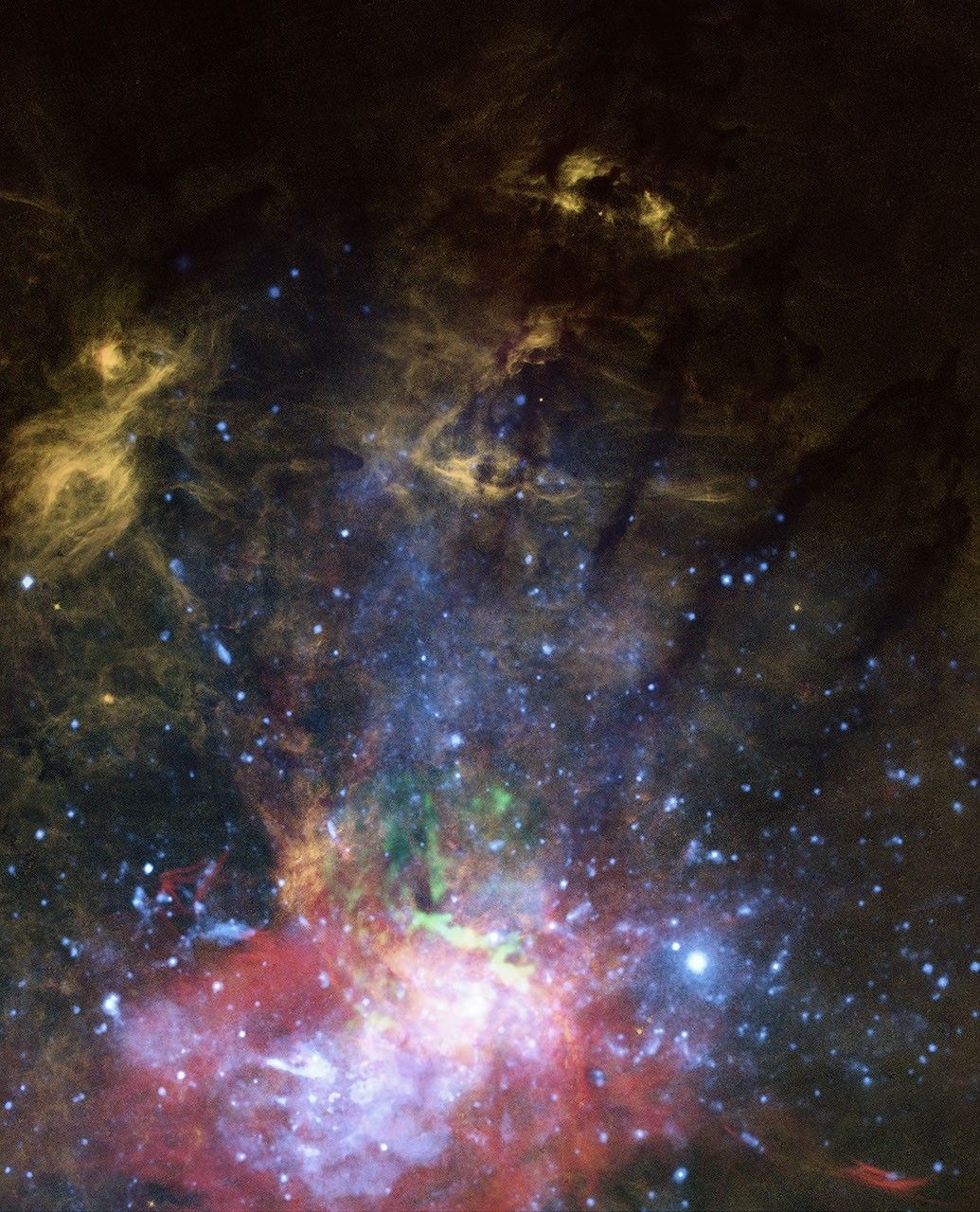 Multiwavelength composite view of Milky Way's center; vertical white fan graphic represents jet's axis from the black hole.