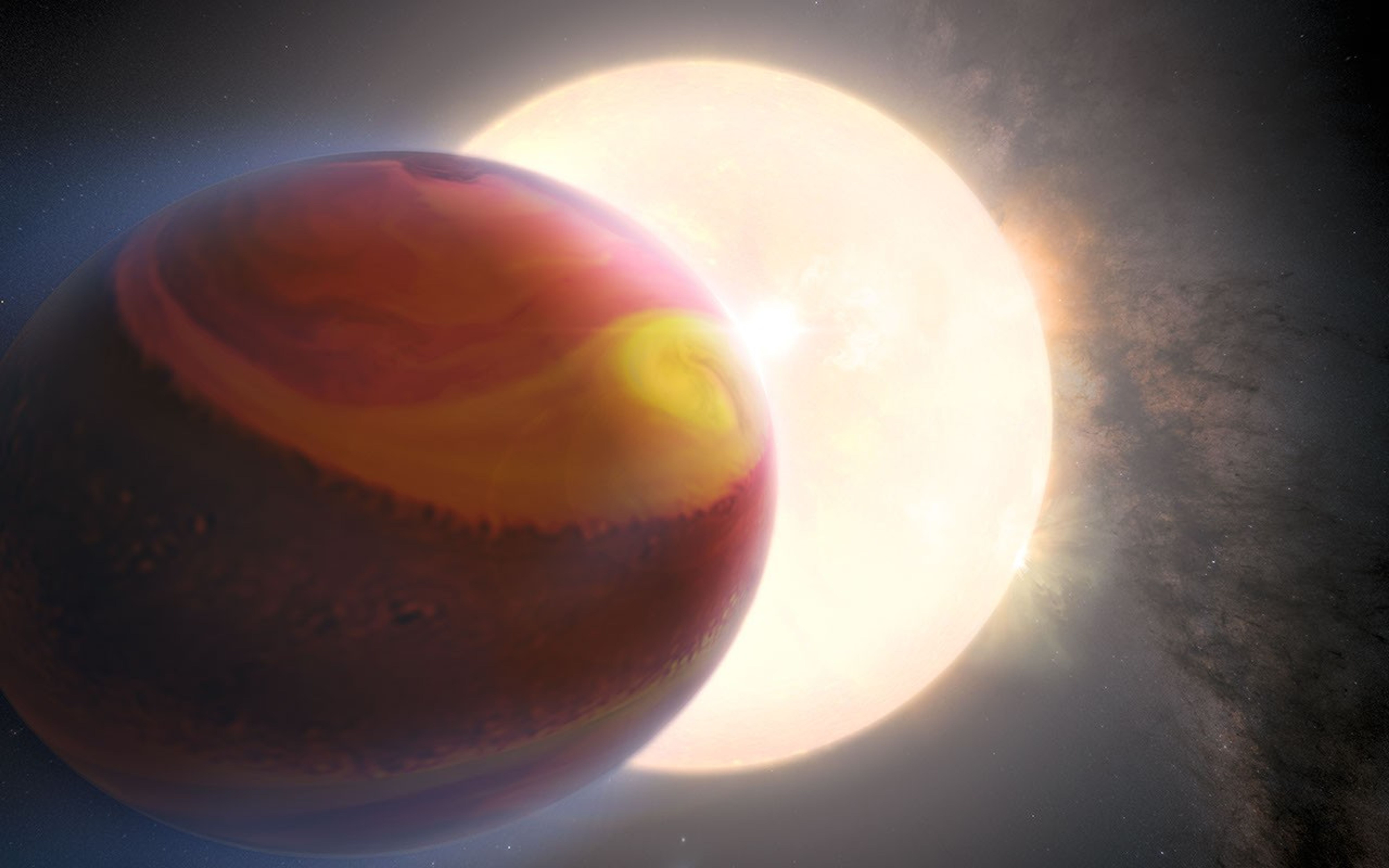An illustration depicting the exoplanet WASP 121-b. The planet dominates the foreground on the left side of the image, and appears banded with colors of red, yellow, and orange. Behind the planet is a large star that appears similar in size to the exoplanet. The background is made up of fuzzy light gray nearer to the star, and darker grays at the edges. The words "Artist Concept" are in white in the bottom right corner of the image.