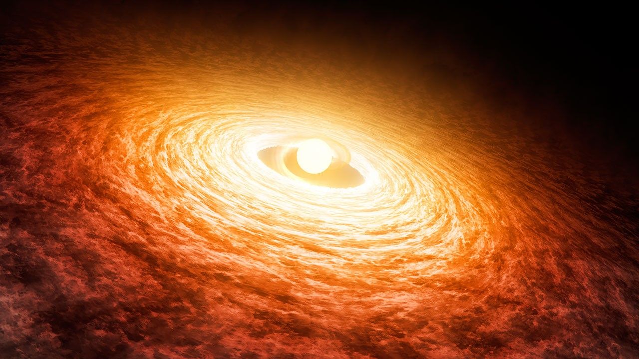 Artist's concept of early stages of the young star FU Orionis outburst. The star, a bright yellow sphere near the center, and its fluffy disk of gas and dust are slightly tilted, extending from the top left corner to the bottom right. The swirling disk is bright yellow close to the star and gradually transitions to dark orange moving toward the edges of the frame. The top left and right corners reveal a black, starless background.