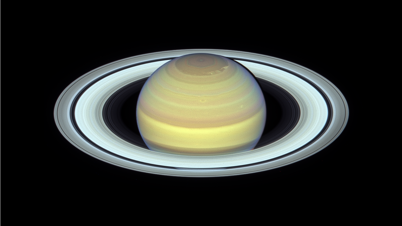 A Hubble image of the planet Saturn taken in 2018 by the OPAL (Outer Planet Atmospheres Legacy) program when the planet's rings were near their maximum tilt toward Earth.