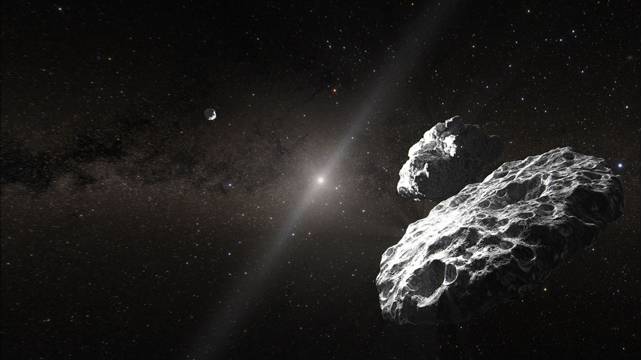 Illustration of two large, cratered rocks in the foreground right. Another rock is seen in the distance to the left. The black background of space shows the hazy Sun and zodiacal light due to dust in the solar system, as well as scattered distant stars. The words "Artist's Concept" appear in gray at the bottom left.