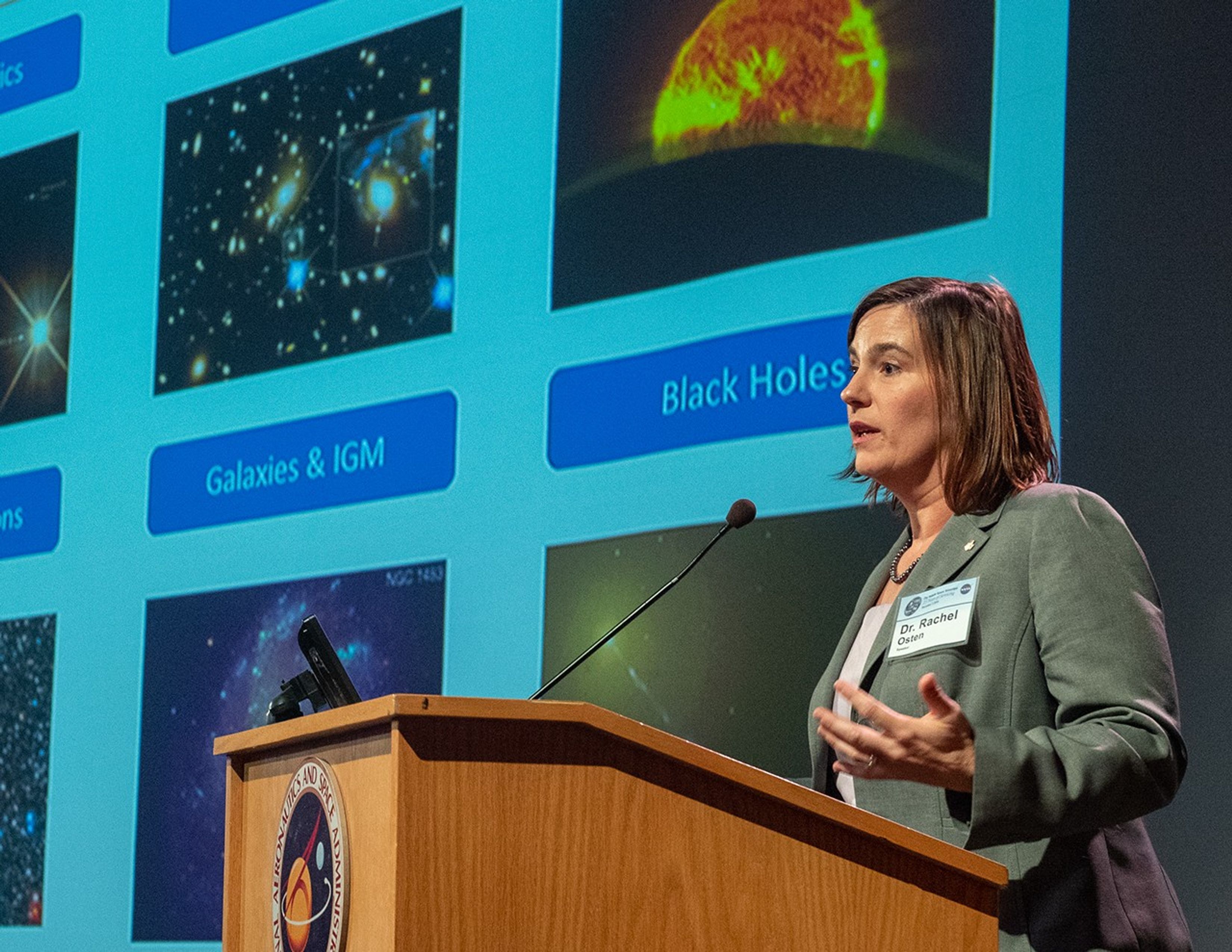 Rachel Osten speaks from the NASA podium.