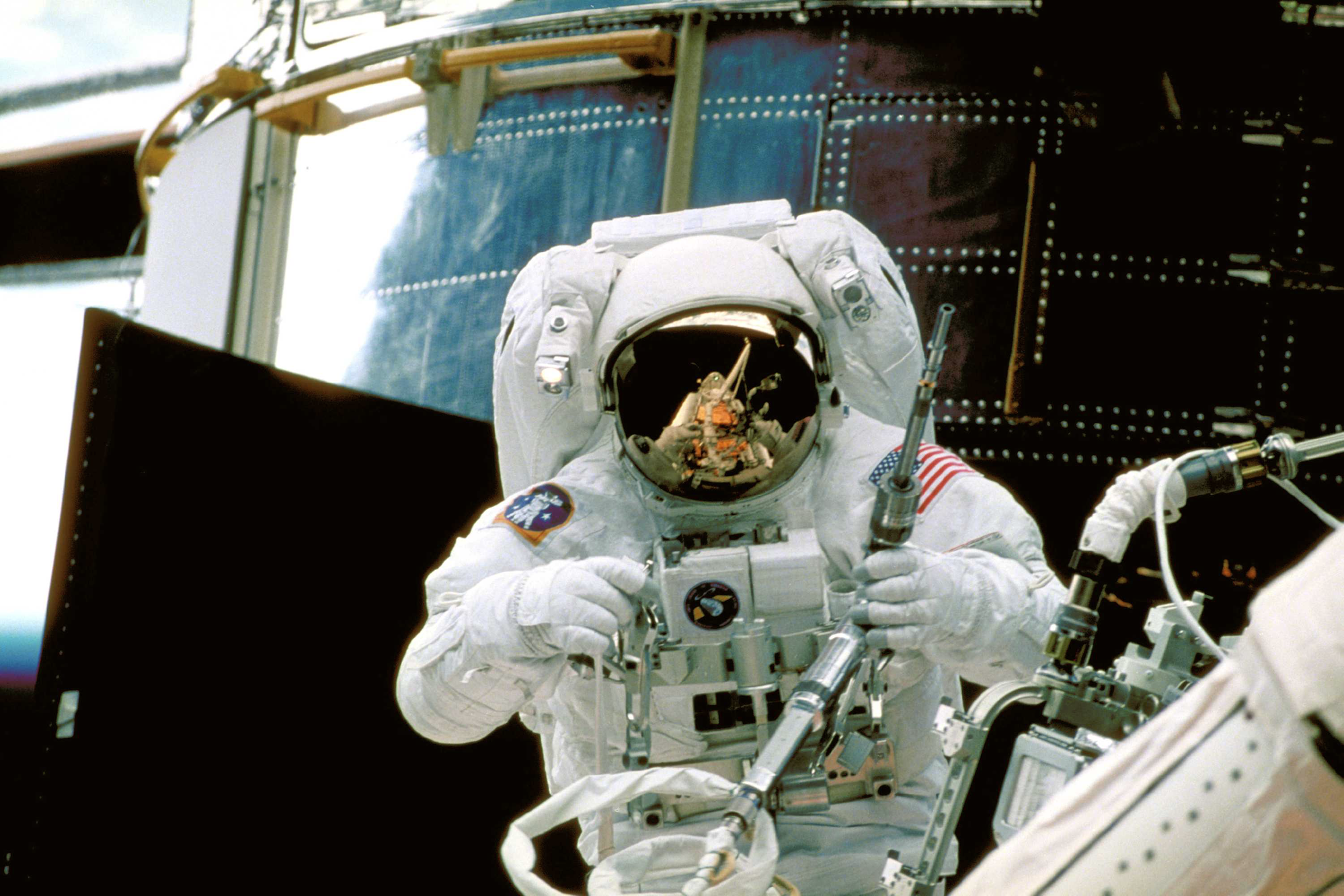 Repairing Hubble with Specially Designed Tools (1997)