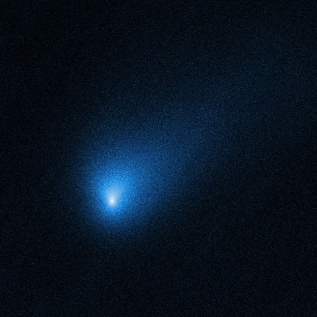 A fuzzy blue structure with a bright white center.