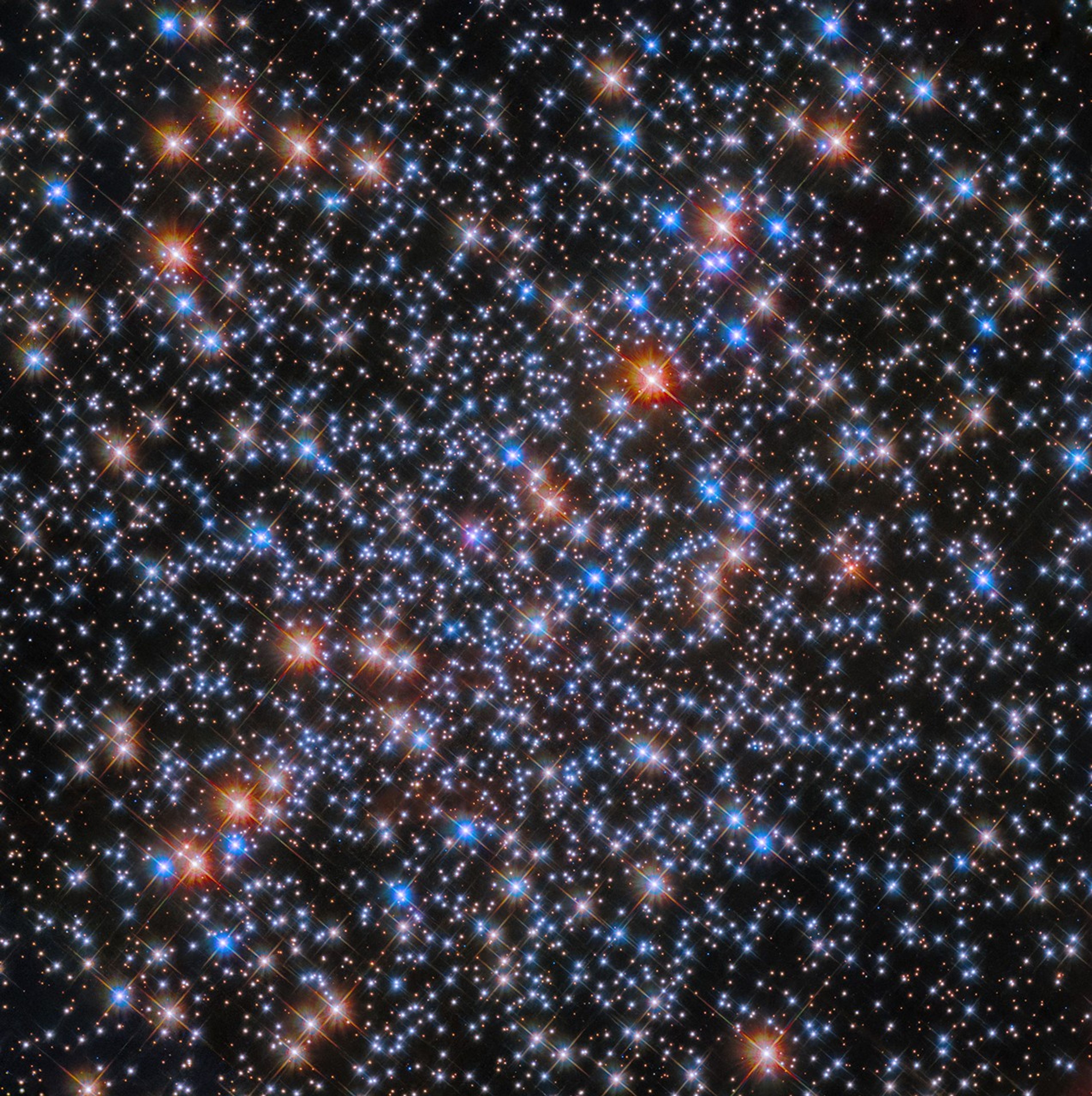 White, blue, orange, and red stars are scattered throughout the scene.