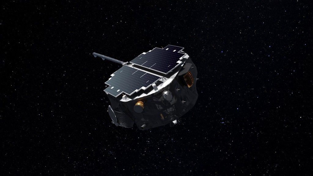 A round-shaped spacecraft with black solar panels on top appears at the center of the image against a black background speckled with white stars.