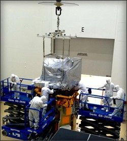 OLI is lowered onto the LDCM spacecraft.