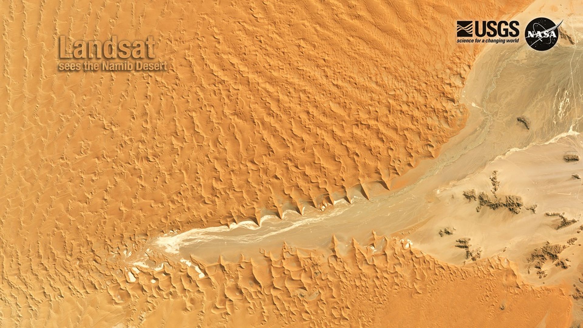 A Landsat scene of the bright tan Namib Desert.