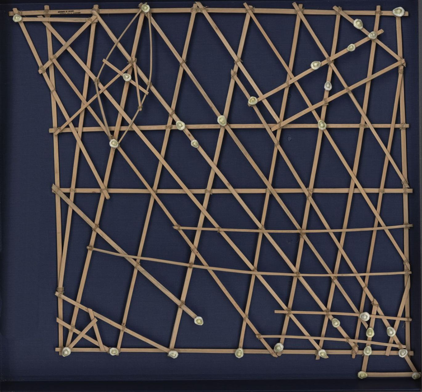 Stick charts of the Marshall Islands use reeds and shells to map groups of islands. The sticks were arranged to represent the pattern of wave swells caused by winds and positions of the islands marked by shells.