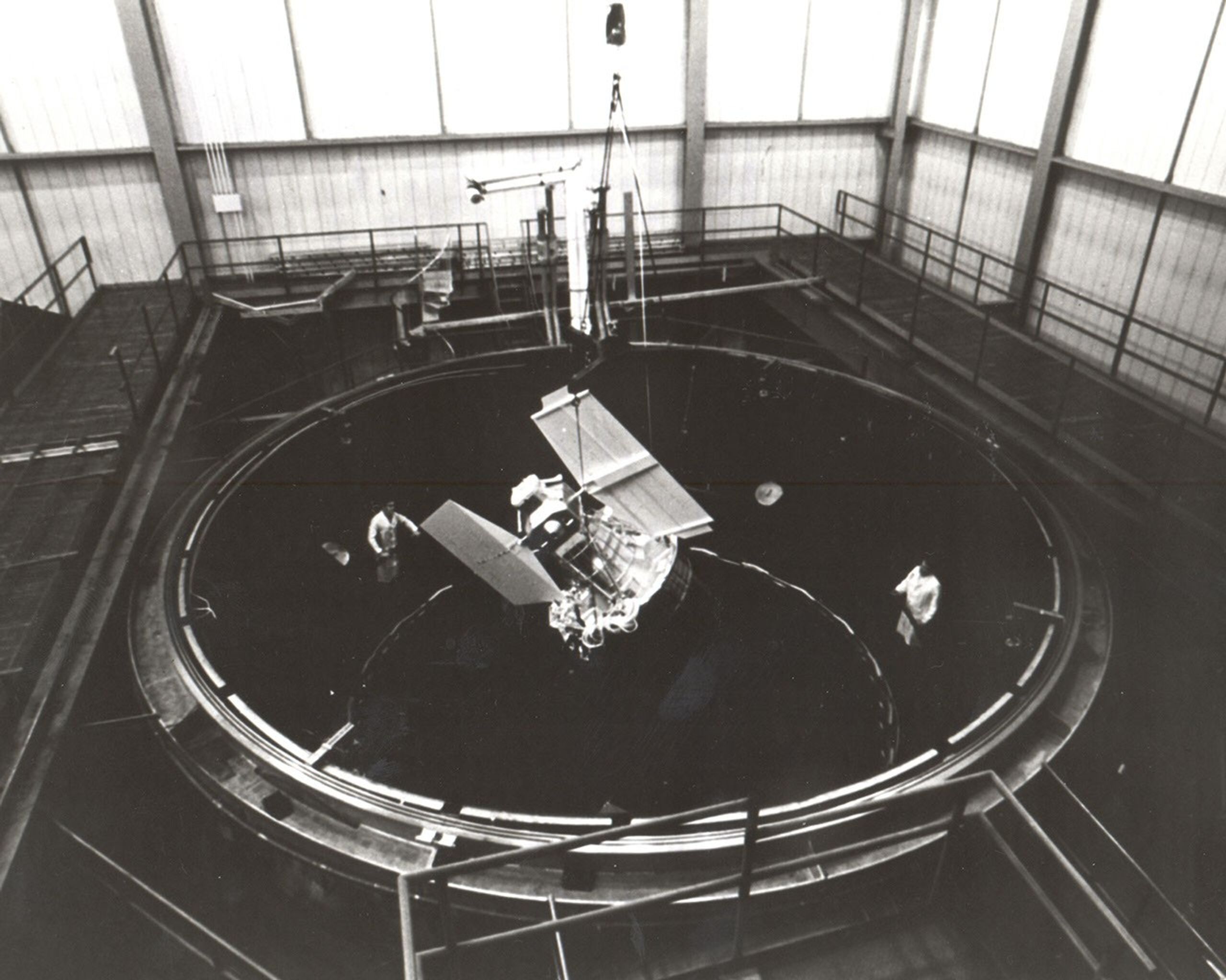 The Earth Resources Technology Satellite (ERTS) mockup in a spin test chamber at GE’s Space Division in Valley Forge, PA.