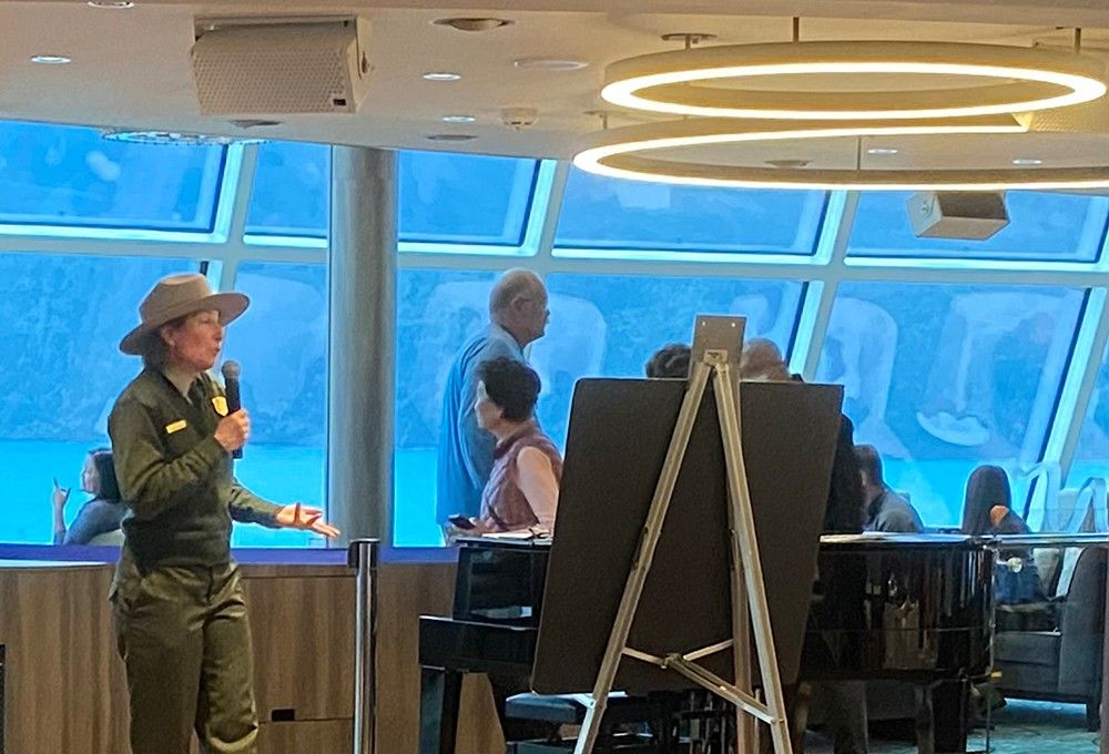 NPS Ranger Buchheit talks to cruise ship passengers in Glacier Bay