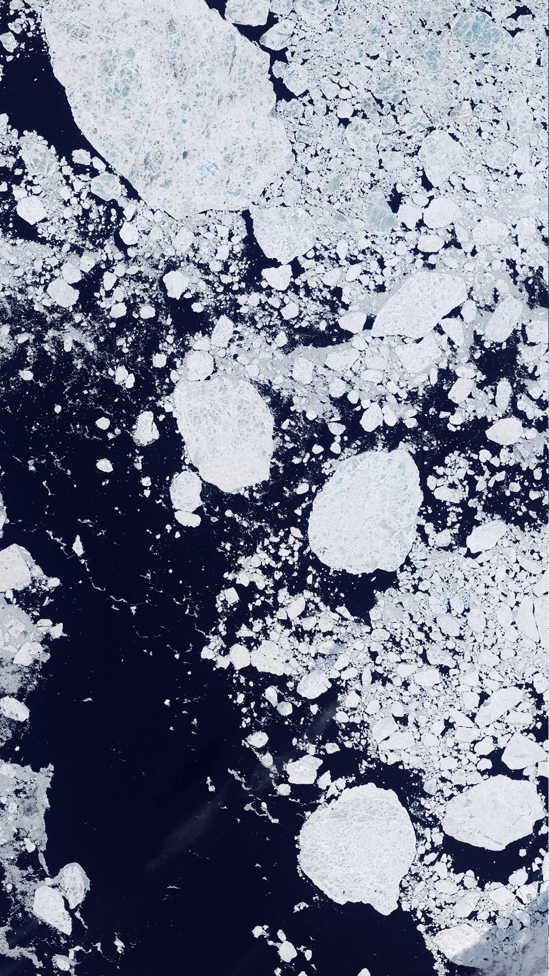 A natural-color Landsat satellite image of the Artic Sea.