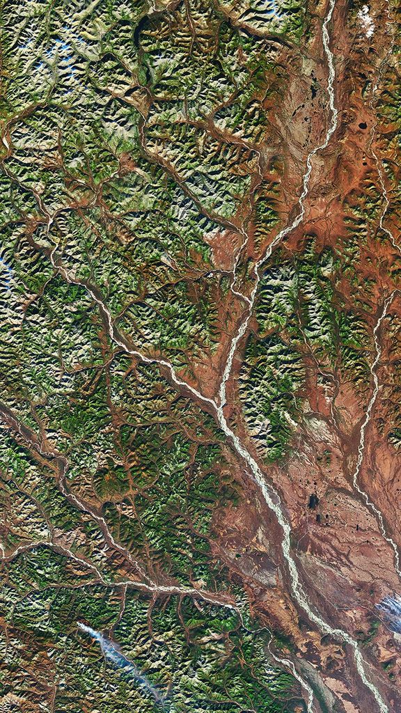 A natural-color satellite image of the Dzhugdzhur Mountains.