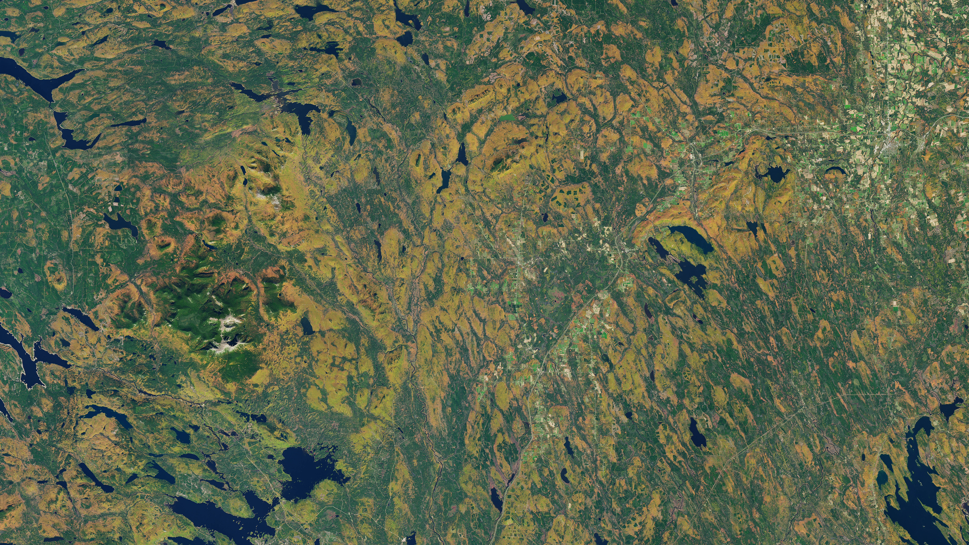 A natural-color Landsat 8 satellite image of Patten, Maine. This image was acquired on October 13, 2017.