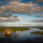 photo of water reflecting sky