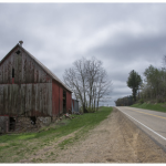photo of old house and road