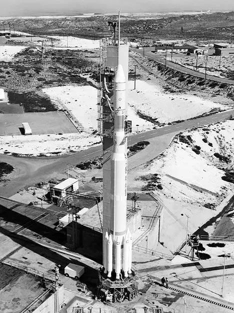 Black and white photograph of the Landsat 1 satellite on the Delta rocket in 1972.