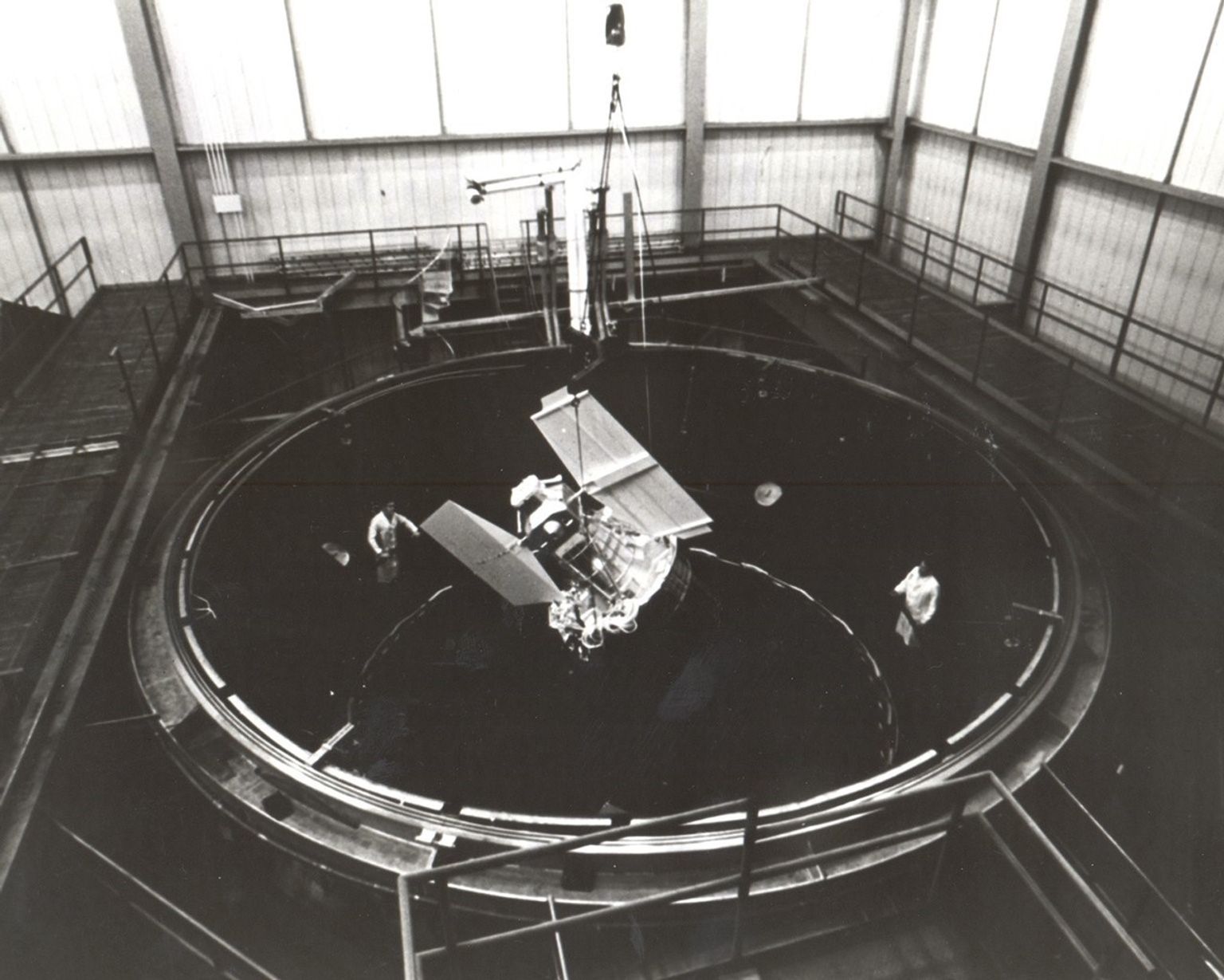 A Black and White Photograph of ERTS (Landsat 1) in a test chamber at GE’s Space Division in Valley Forge, PA.