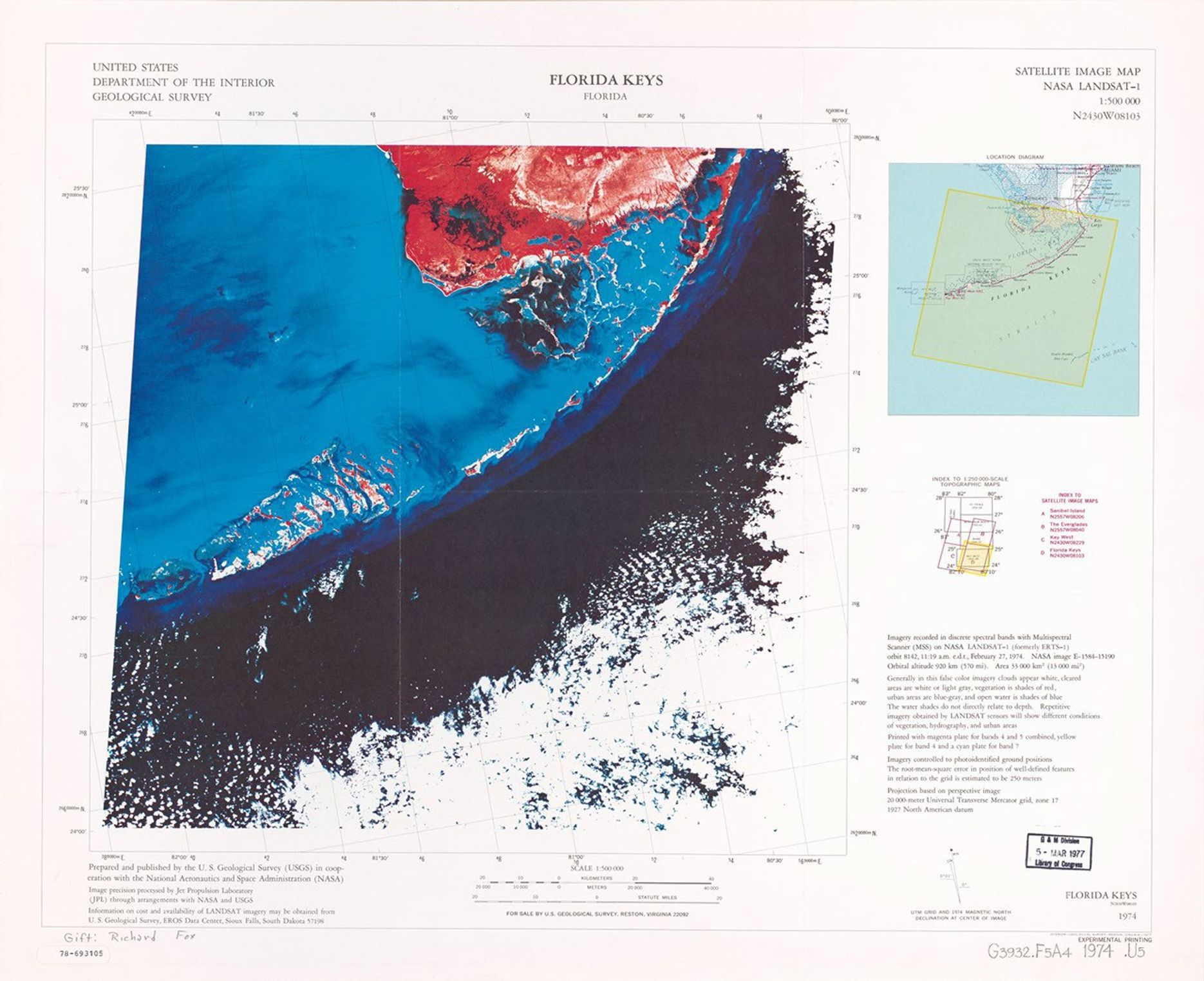 A false-color satellite image map of the Florida Keys from 1974, produced by NASA's LANDSAT-1. The image shows the curved chain of islands extending southwest from the Florida mainland, with land appearing in reddish-white tones and varying shades of blue indicating different water depths. The map includes coordinate grids, a location diagram, and explanatory text.