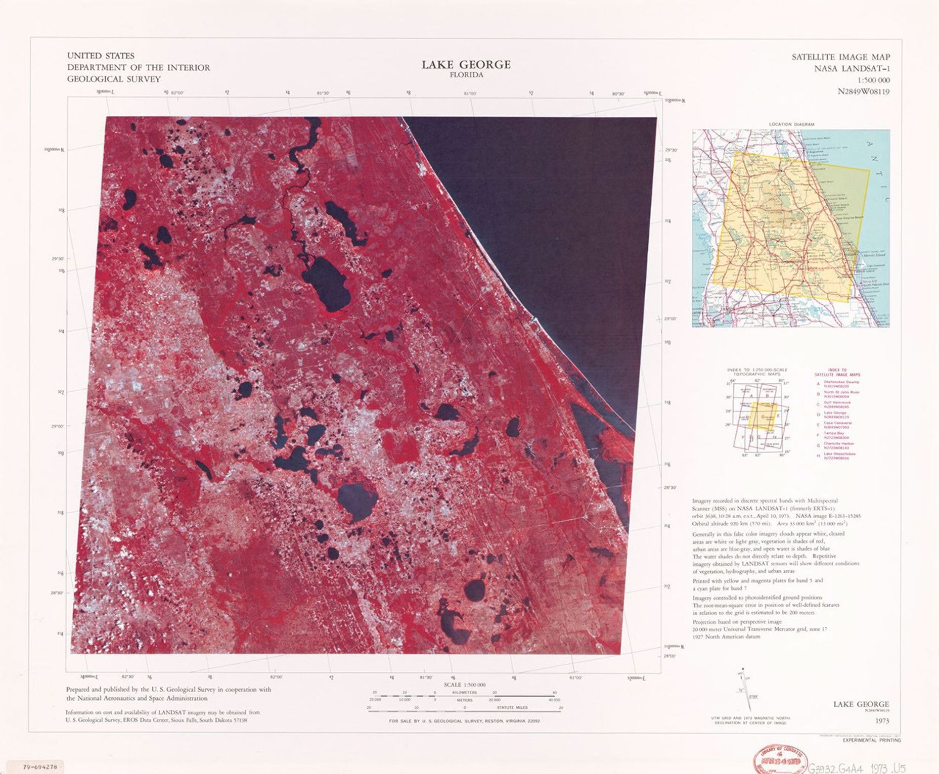 A false-color satellite image map of Lake George, Florida, from 1973, produced using NASA LANDSAT-1 data. The image shows Lake George as a dark blue body of water amid reddish-pink vegetated areas, with numerous smaller lakes scattered throughout the region. The Atlantic coast appears along the right edge. The map includes coordinate grids, a location diagram, and explanatory text in the margins.