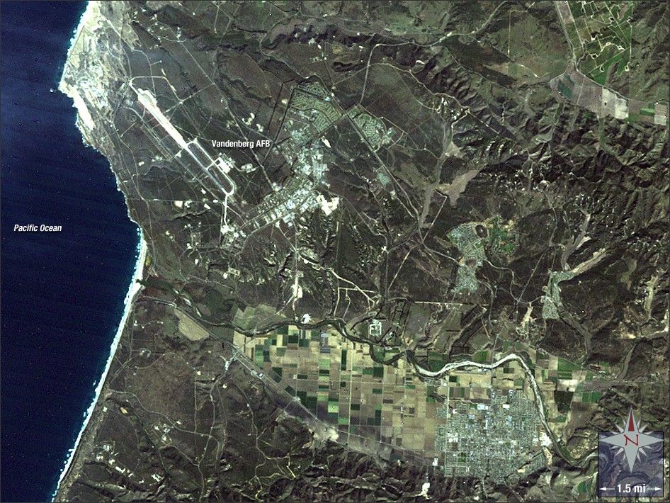 On July 16, 1982 Landsat 4 was successfully launched from Vandenberg Air Force Base in central California. Landsat 4 carried the Multispectral Scanner System (MSS) instrument, as well as a sensor with improved spectral and spatial resolution known as the Thematic Mapper (TM). In this image the ocean is dark blue, the bare ground is brown, agricultural fields are various shades of green, and Vandenberg’s landing strip is bright white.