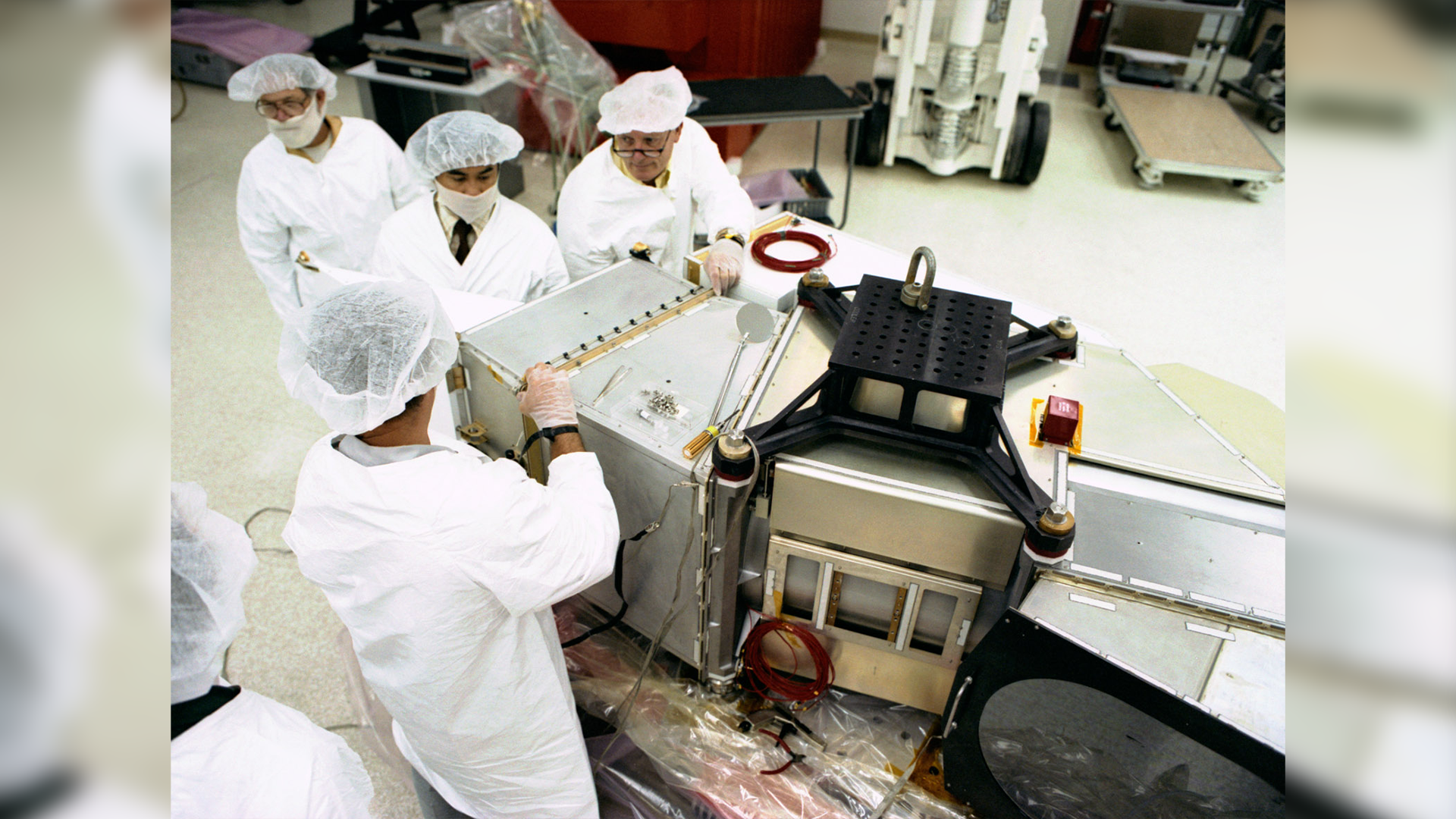 Landsat 5’s thematic mapper (TM) under construction at the Hughes Santa Barbara Research Center in 1982.