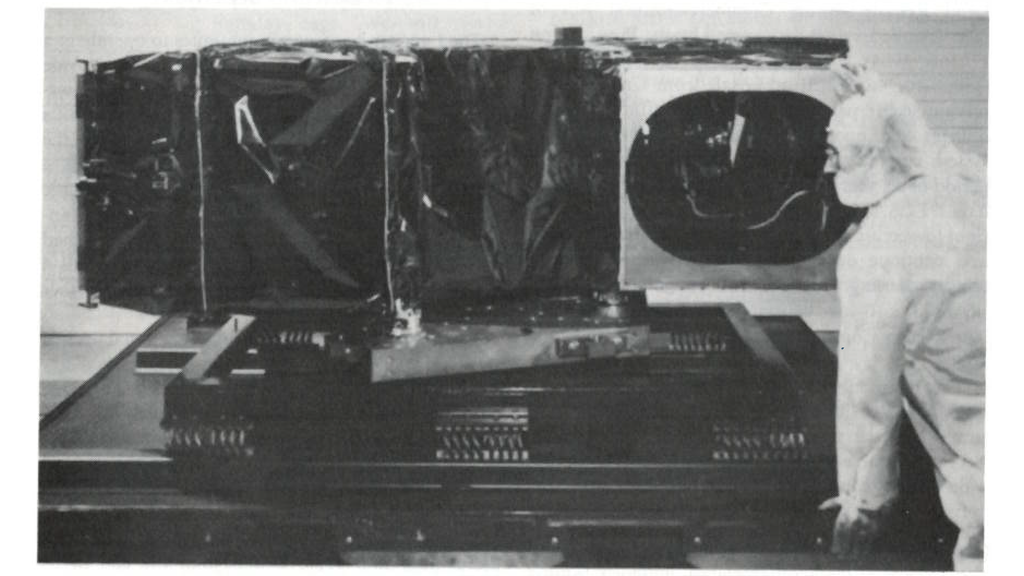 A photograph of the Protoflight Thematic Mapper on shipping container base, aperture view.