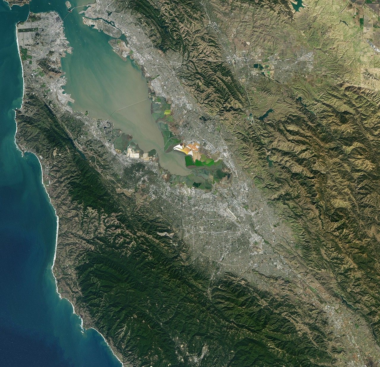 Landsat 7 image of the Santa Clara area acquired Nov 16, 2015.  Landsat 7 is a U.S. satellite used to acquire remotely sensed images of the Earth's land surface and surrounding coastal regions. It is maintained by the Landsat 7 Project Science Office at the NASA Goddard Space Flight Center in Greenbelt, MD...Landsat satellites have been acquiring images of the Earth’s land surface since 1972. Currently there are more than 2 million Landsat images in the National Satellite Land Remote Sensing Data Archive.