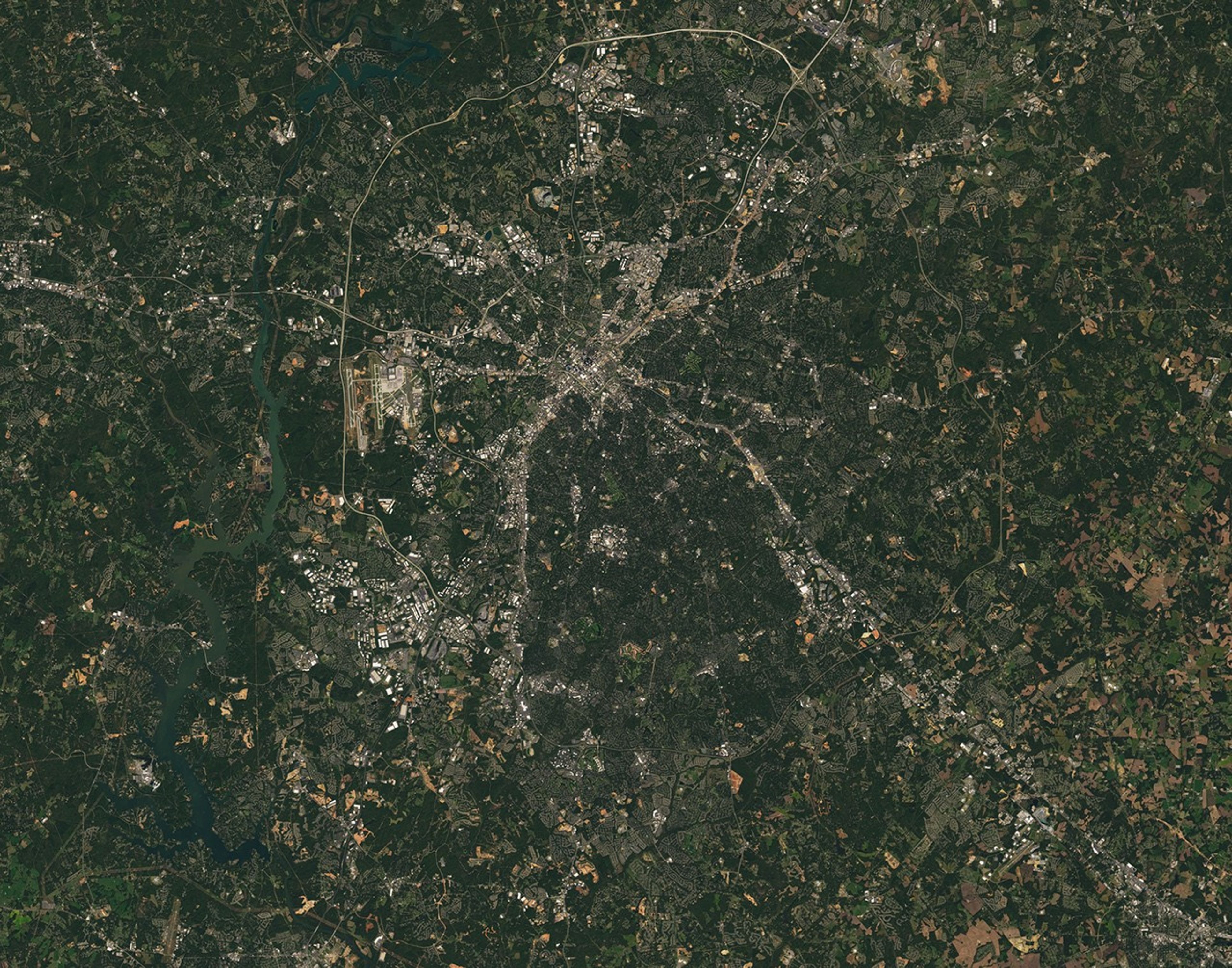 Landsat 7 image of the Charlotte, NC area acquired Oct 18, 2015.  Landsat 7 is a U.S. satellite used to acquire remotely sensed images of the Earth's land surface and surrounding coastal regions. It is maintained by the Landsat 7 Project Science Office at the NASA Goddard Space Flight Center in Greenbelt, MD...Landsat satellites have been acquiring images of the Earth’s land surface since 1972. Currently there are more than 2 million Landsat images in the National Satellite Land Remote Sensing Data Archive.