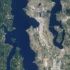 Landsat 7 image of Seattle, Washington acquired August 23, 2014. Landsat 7 is a U.S. satellite used to acquire remotely sensed images of the Earth's land surface and surrounding coastal regions. It is maintained by the Landsat 7 Project Science Office at the NASA Goddard Space Flight Center in Greenbelt, MD. Landsat satellites have been acquiring images of the Earth’s land surface since 1972. Currently there are more than 2 million Landsat images in the National Satellite Land Remote Sensing Data Archive.