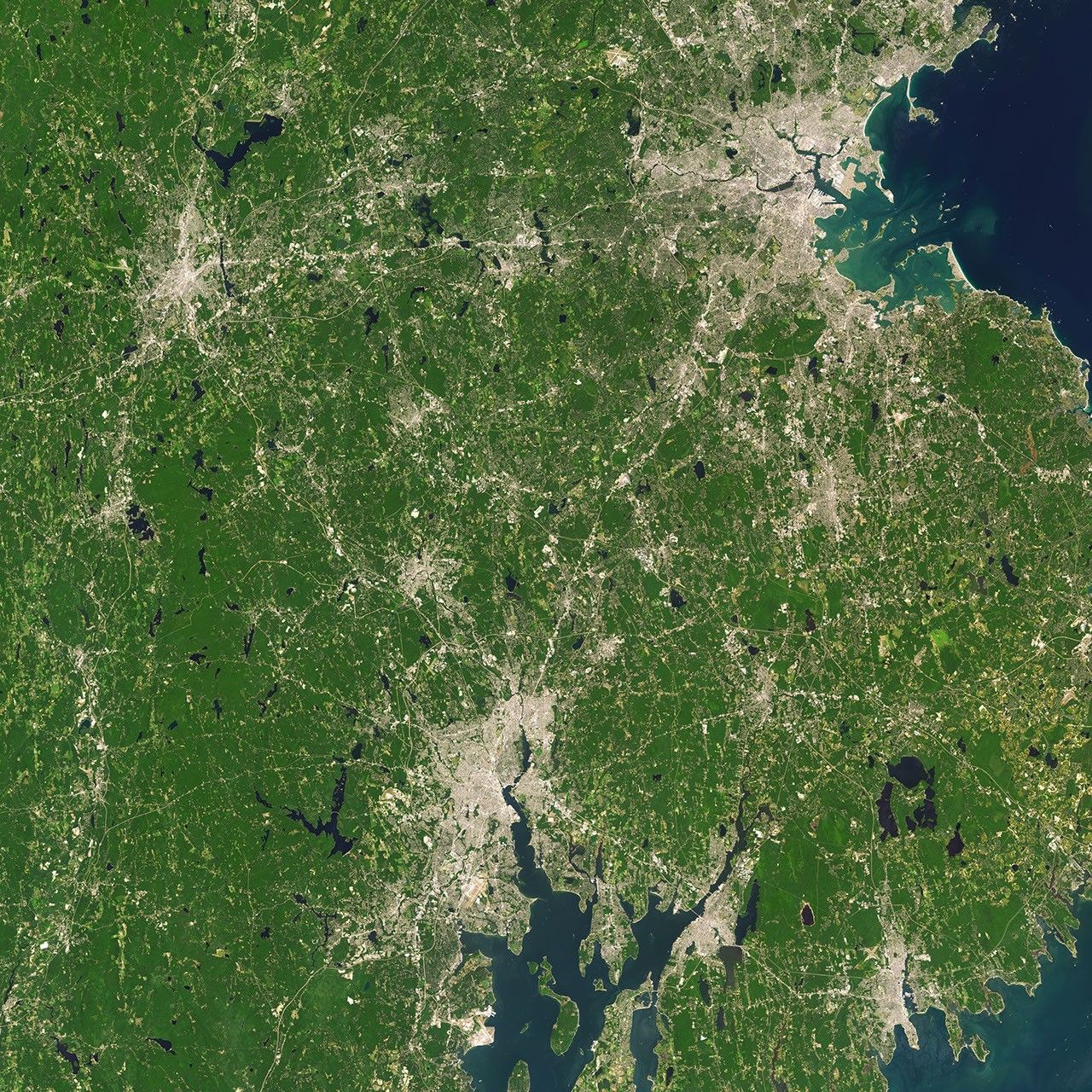 Landsat 7 image of Boston/Providence area acquired August 25, 2014.  Landsat 7 is a U.S. satellite used to acquire remotely sensed images of the Earth's land surface and surrounding coastal regions. It is maintained by the Landsat 7 Project Science Office at the NASA Goddard Space Flight Center in Greenbelt, MD...Landsat satellites have been acquiring images of the Earth’s land surface since 1972. Currently there are more than 2 million Landsat images in the National Satellite Land Remote Sensing Data Archive.