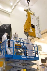 TIRS being hoisted into place on the LDCM satellite in Gilbert, Ariz.