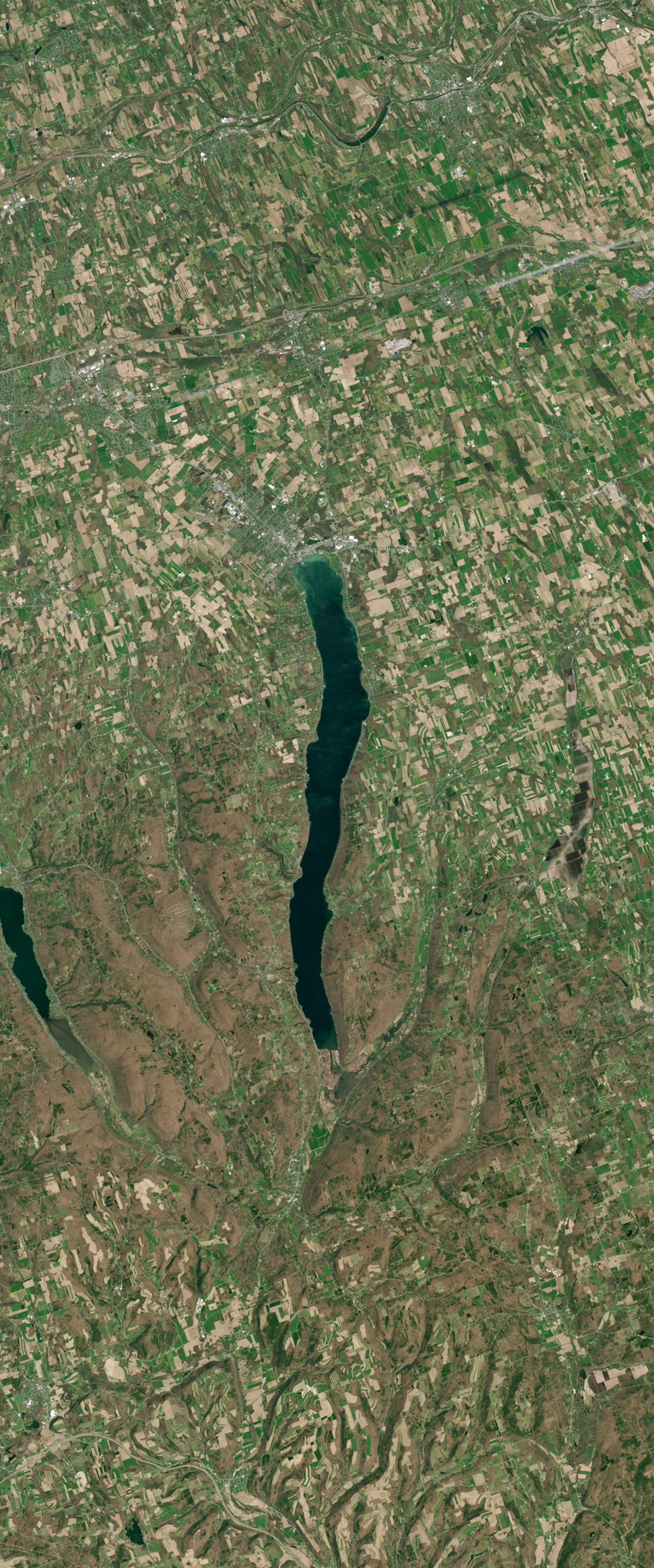 Landsat satellite image of a long thin lake forms the capital letter I.