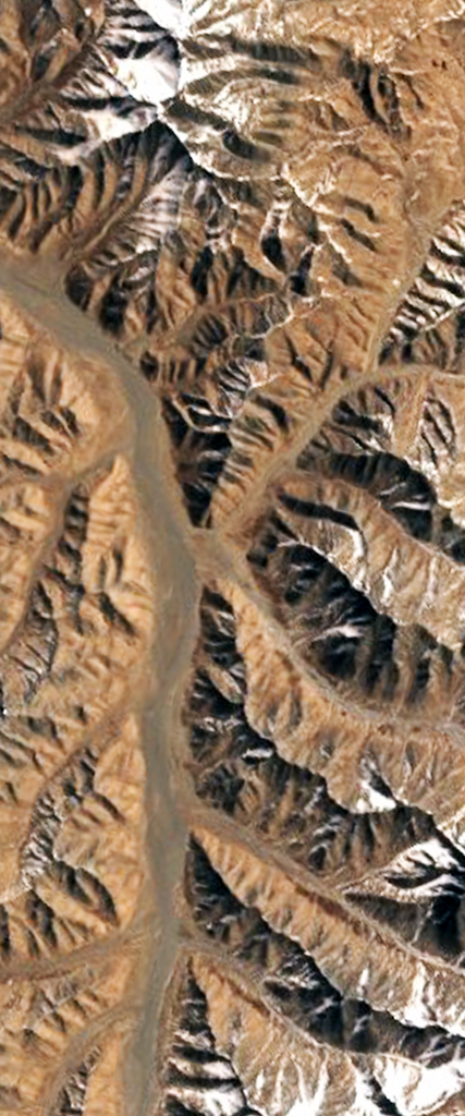 Mountain tops form the capital letter K in this Landsat satellite image.
