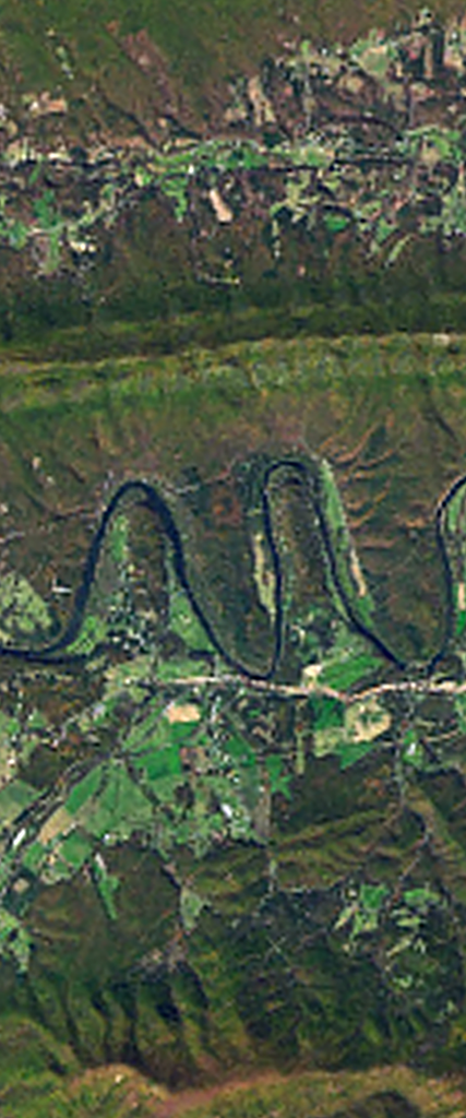 Landsat satellite image showing a curvy river forming the lower case letter M.