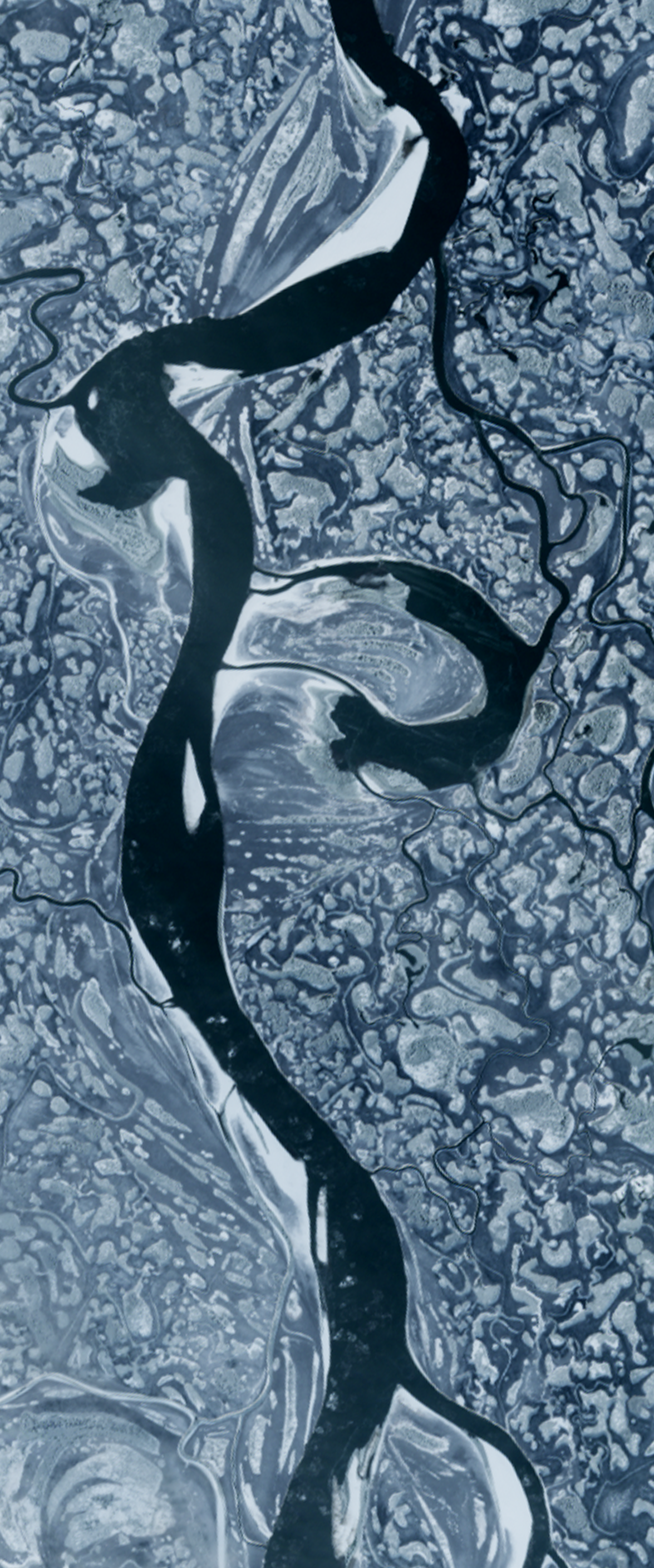 Landsat satellite image of a meandering river that forms the lower case letter P.