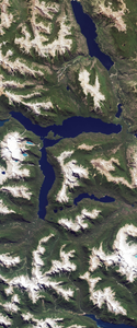 Landsat satellite image of a lake that forms the lower case letter R.