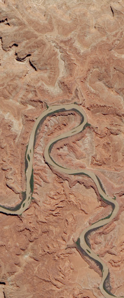 Curvy river forms the upper case letter R in this Landsat satellite image.